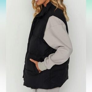 Oversized black puffer vest